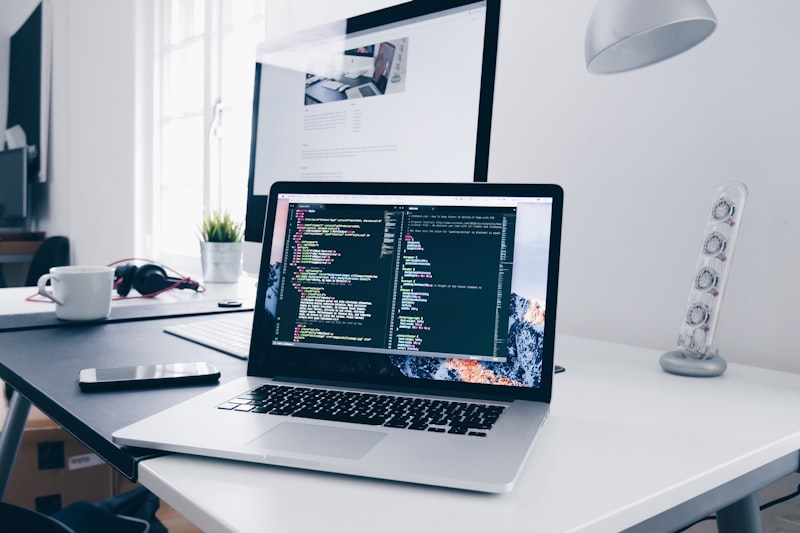 Modern web development workspace with clean code on screen