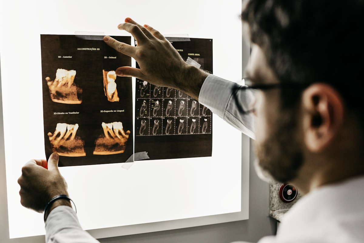 Dentist consulting with patient in a modern treatment room